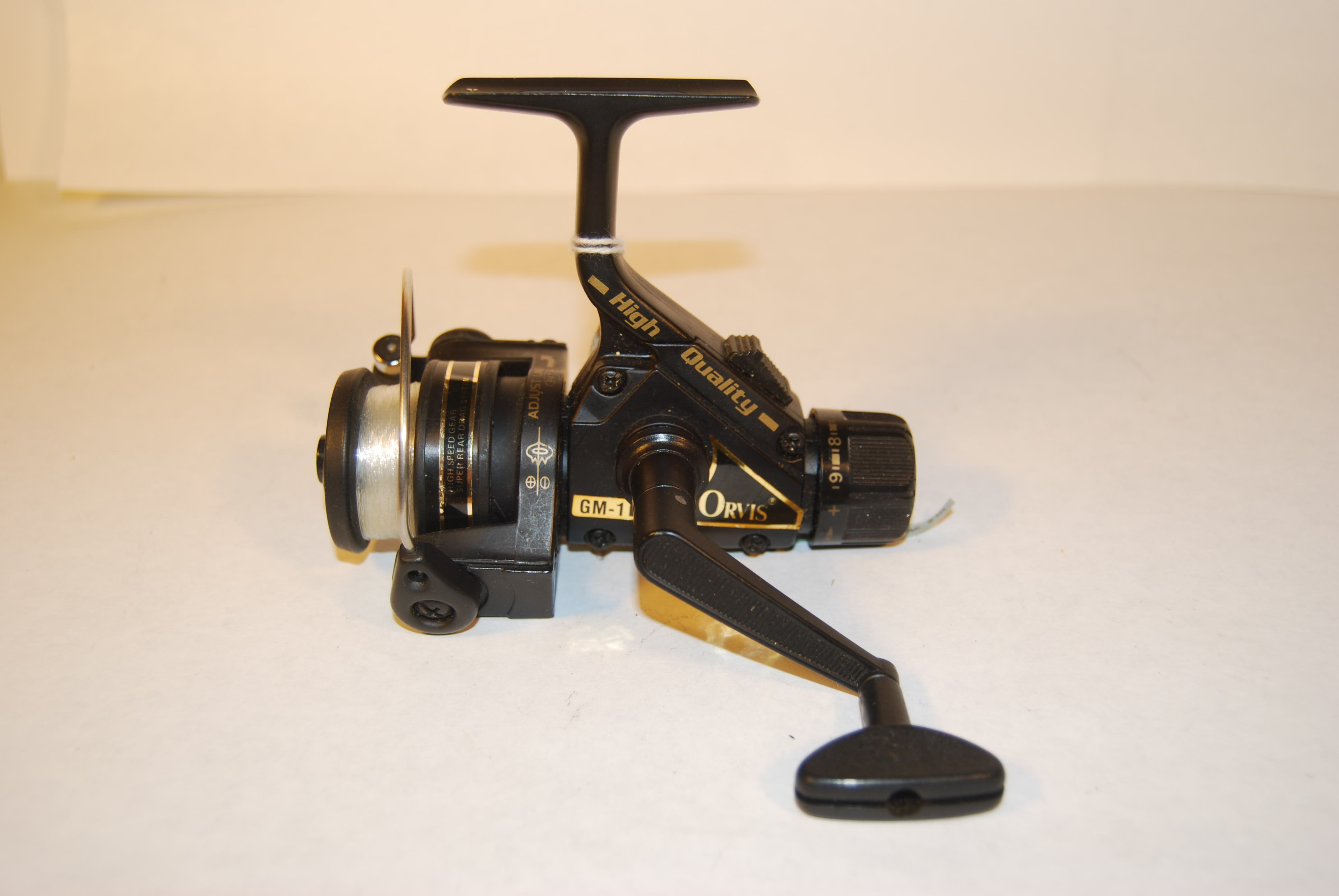 ORVIS “GM1” Spin Reel. Cap. 240 yd. 4 mono. Rear drag adjustment; RH/LH.
